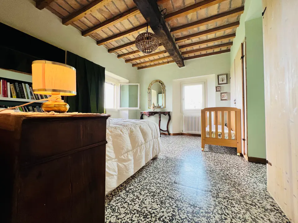 Anticamera di Casa Vedetta con letto singolo e culla per bambini